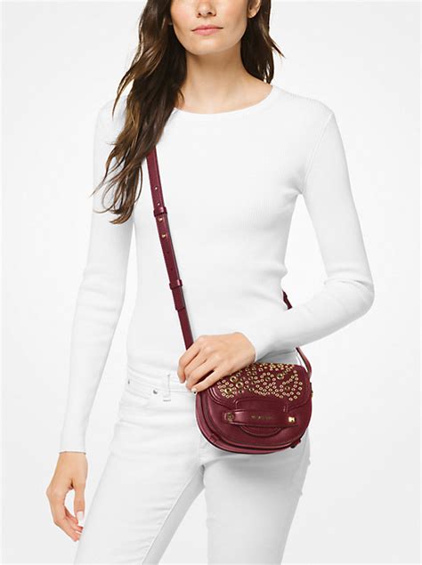 michael kors cary small grommeted leather saddle bag|Michael Kors crossbody bag.